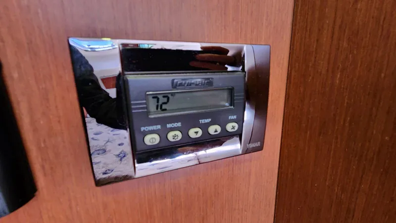 Slide: The Image of Thermostat control panel on 2015 Beneteau Swift Trawler 34, displaying temperature 7.2 degrees. - 44