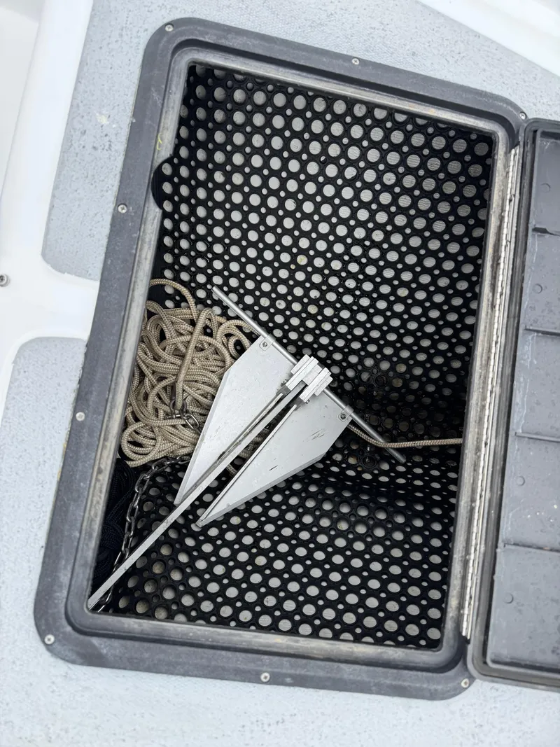 Slide: The Image of Anchor and rope in storage compartment of 1995 Nautica 33 Commercial RIB boat. - 8