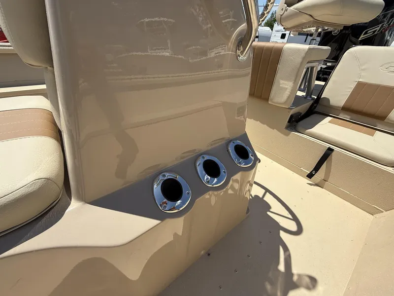 Slide: The Image of Interior of 2025 G3 Bay 20 boat with beige seating and cup holders. - 4