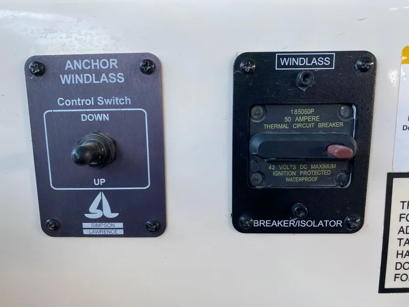 Slide: The Image of Control panel for anchor windlass on 2006 Rinker 270 Express Cruiser. - 25
