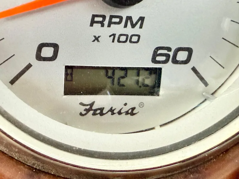 Slide: The Image of Close-up of a Faria tachometer showing 421.2 hours on a 2006 Rinker 270 Express Cruiser. - 27