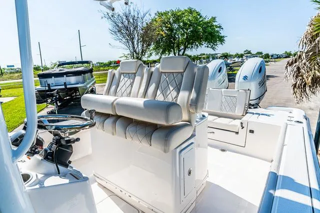 Slide: The Image of Compass on 2022 Blue Wave 2800 Makaira boat dashboard. - 11