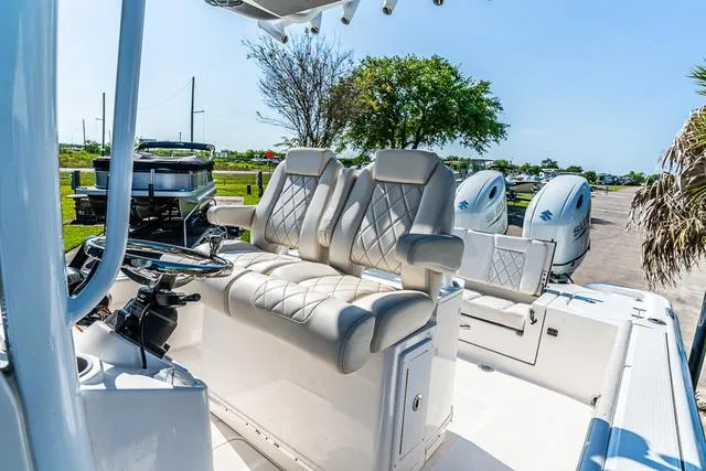 Slide: The Image of Interior view of 2022 Blue Wave 2800 Makaira boat, featuring a sleek design. - 12