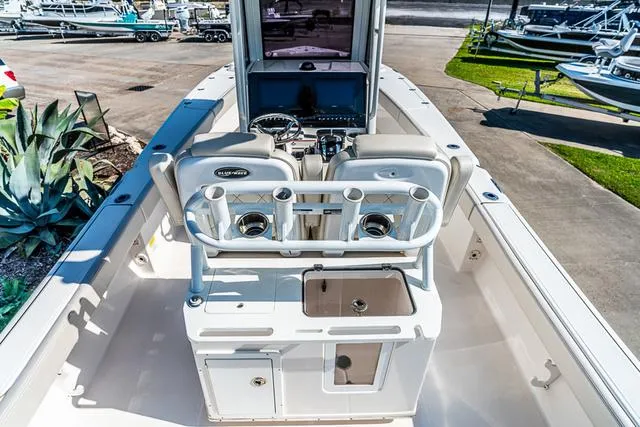 Slide: The Image of 2022 Blue Wave 2800 Makaira boat interior with compact marine toilet. - 7