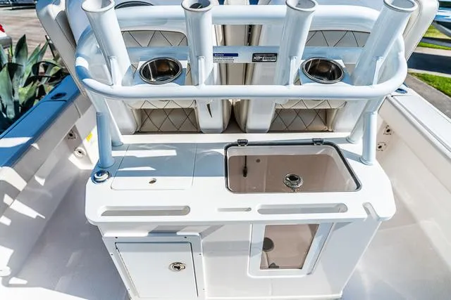 Slide: The Image of Suzuki 350 outboard motor on 2022 Blue Wave 2800 Makaira boat, close-up view. - 9