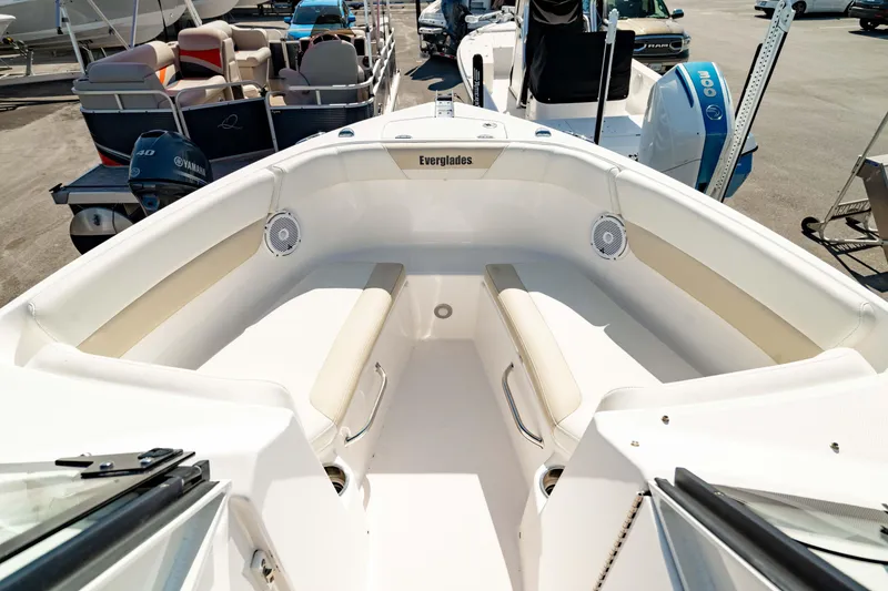 Slide: The Image of 2016 Everglades 230 Dual Console boat interior with seating and speakers. - 5