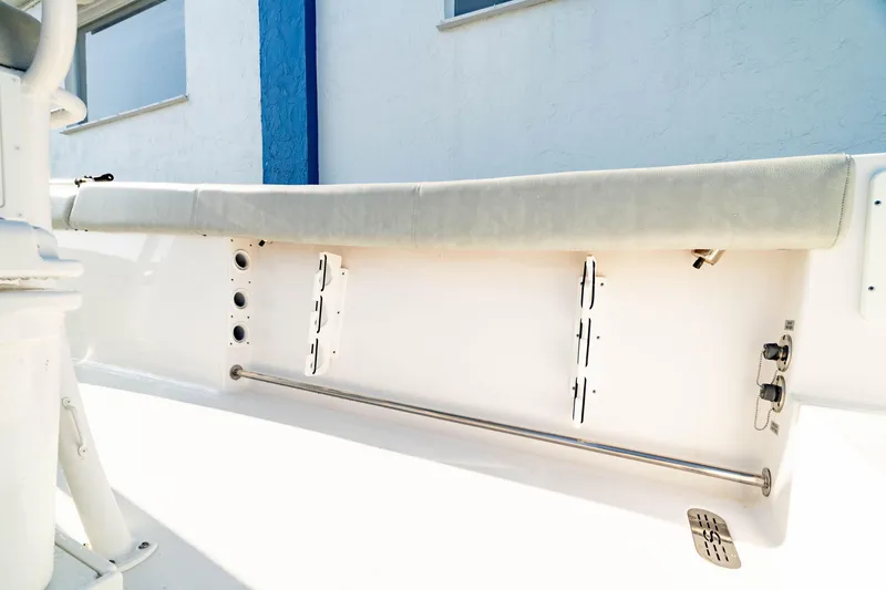 Slide: The Image of 2020 Sportsman Heritage 251 Center Console interior detail with seating and rod holders. - 15