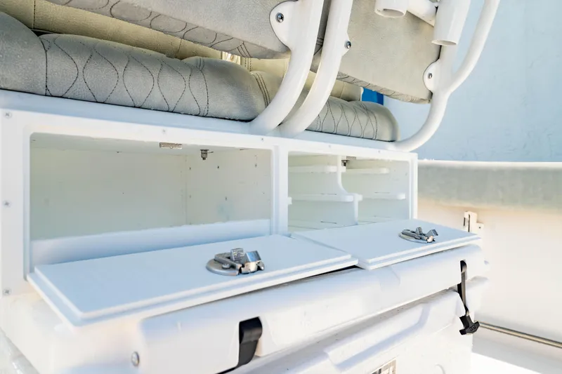 Slide: The Image of 2020 Sportsman Heritage 251 Center Console storage compartments and seating detail. - 16
