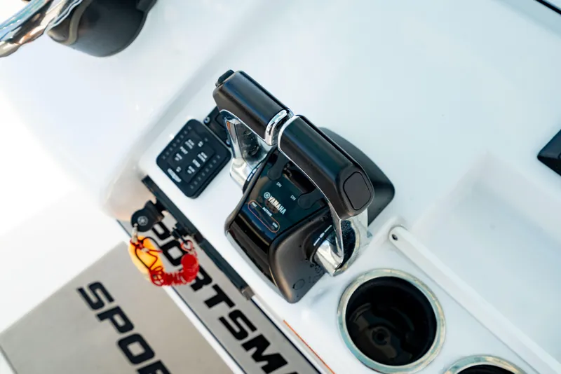 Slide: The Image of Close-up of 2020 Sportsman Heritage 251 Center Console boat controls and dashboard. - 22