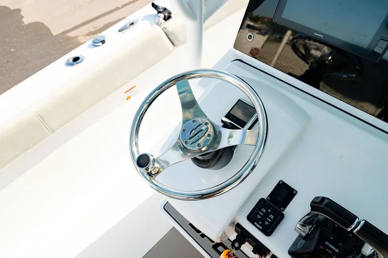 Slide: The Image of 2020 Sportsman Heritage 251 Center Console steering wheel and control panel. - 24