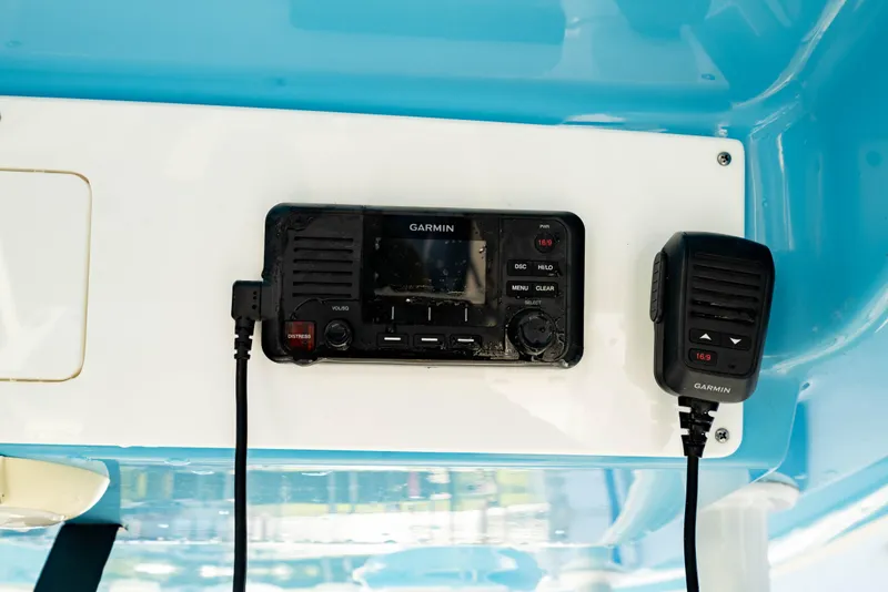 Slide: The Image of Garmin radio system on 2020 Sportsman Heritage 251 Center Console boat. - 25