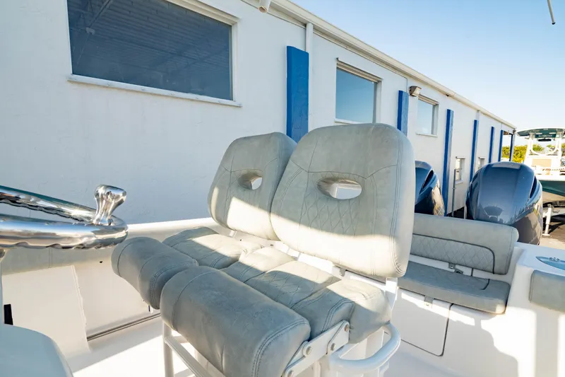 Slide: The Image of 2020 Sportsman Heritage 251 Center Console boat with dual seats and modern design. - 27