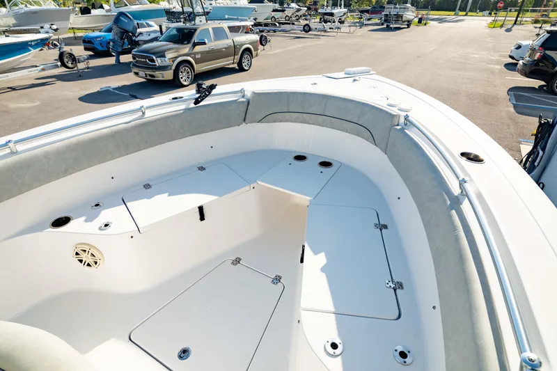 Slide: The Image of 2020 Sportsman Heritage 251 Center Console boat interior, featuring spacious seating and storage. - 33