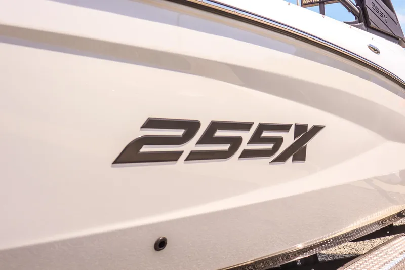 Slide: The Image of 2024 Yamaha Boats 255XD model, close-up of sleek exterior design. - 12