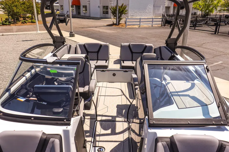 Slide: The Image of 2024 Yamaha Boats 255XD interior, showcasing spacious seating and modern design. - 18