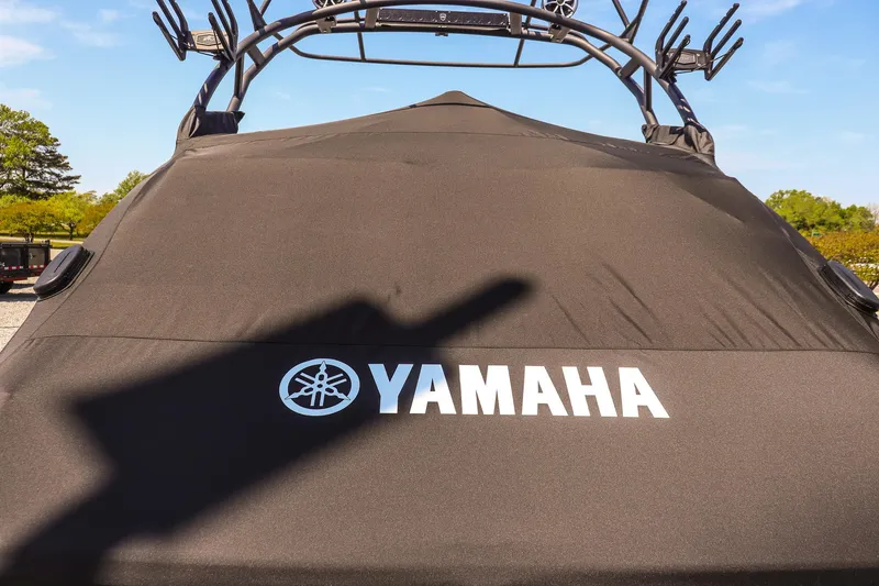 Slide: The Image of 2024 Yamaha Boats 255XD covered, showcasing sleek design and Yamaha branding. - 2
