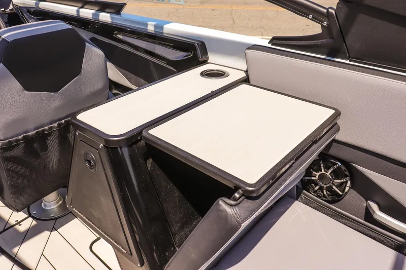 Slide: The Image of 2024 Yamaha Boats 255XD interior with sleek seating and modern design features. - 23