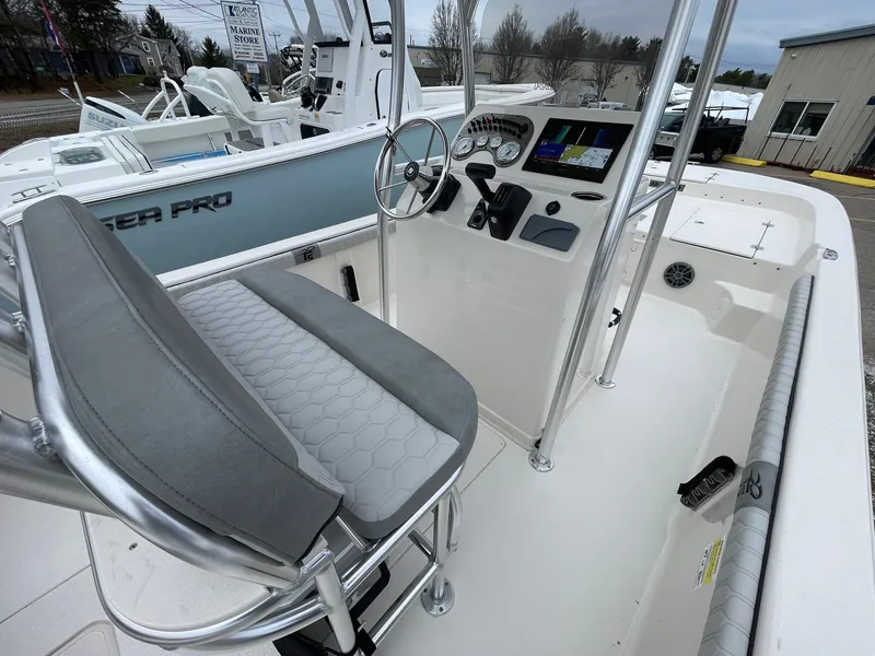 Slide: The Image of 2025 Carolina Skiff 21 LS boat interior with steering console and seating. - 8