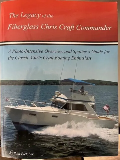Slide: The Image of Cover of "The Legacy of the Fiberglass Chris Craft Commander" featuring a 1970 Chris-Craft Commander Sport Cruiser. - 18