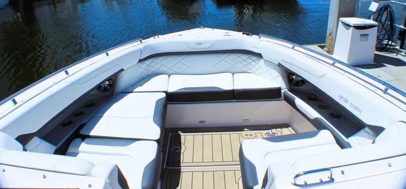 Slide: The Image of 2022 Regal 33 OBX boat interior with spacious seating and elegant design. - 1