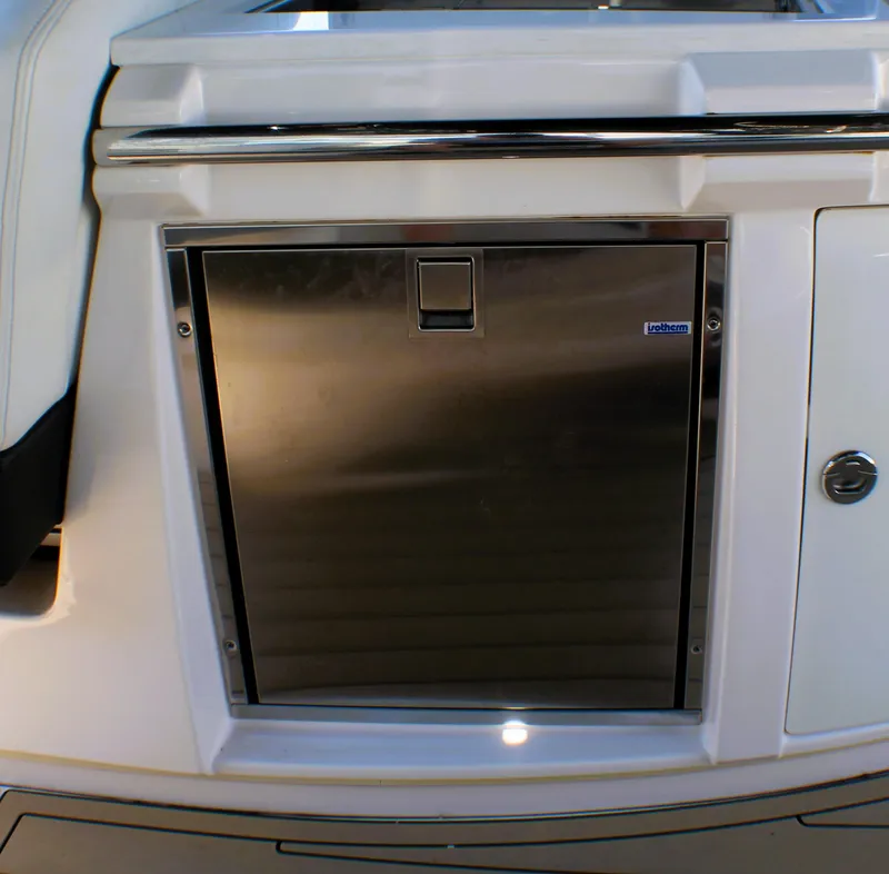 Slide: The Image of Stainless steel appliance on 2022 Regal 33 OBX boat, featuring sleek design and modern finish. - 17