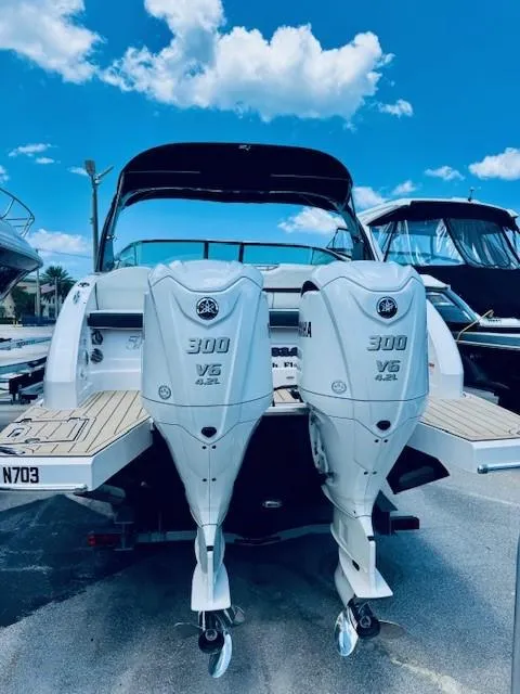 Slide: The Image of 2022 Regal 33 OBX boat with twin Yamaha 300 V6 outboard engines. - 23