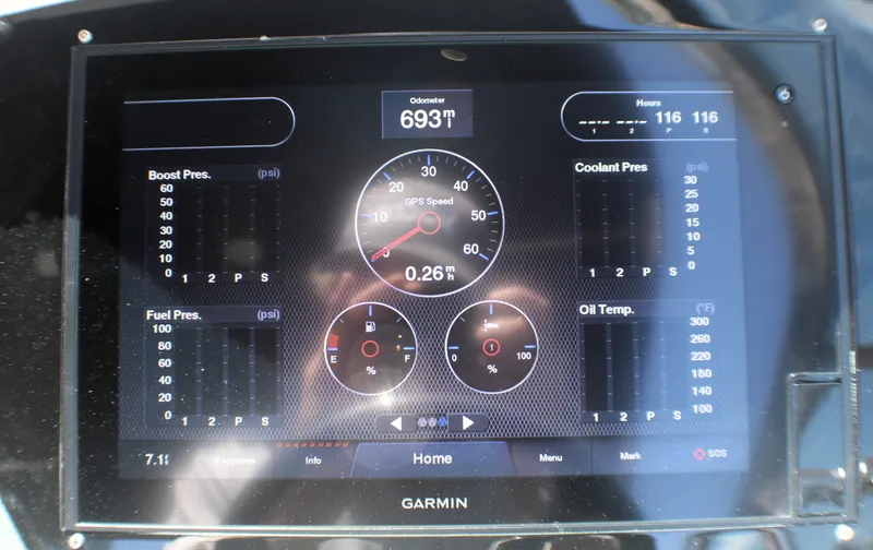 Slide: The Image of Garmin display on 2022 Regal 33 OBX showing speed, odometer, and engine metrics. - 27