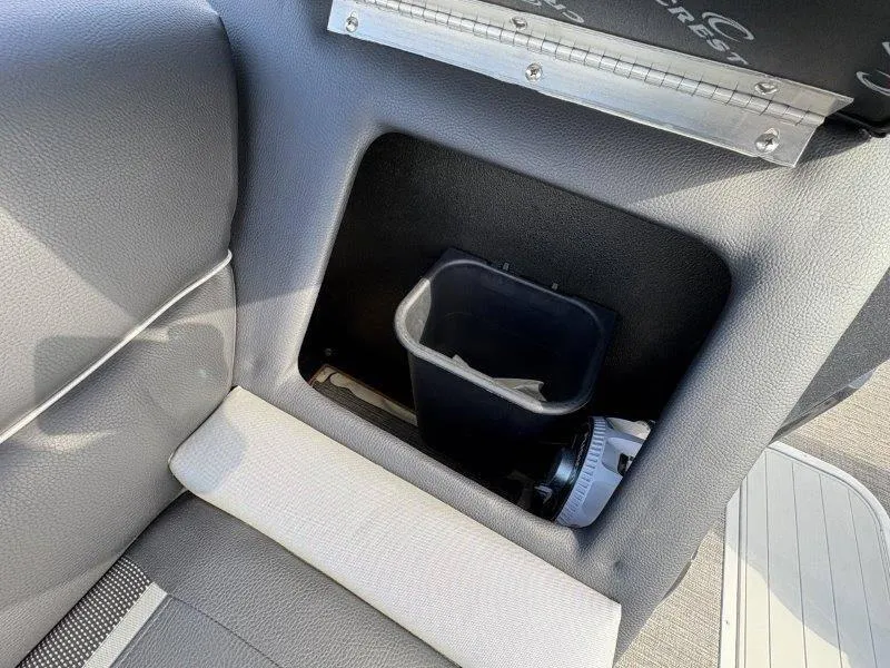 Slide: The Image of Interior storage compartment of 2023 Crest Caribbean RS 230 SLC boat. - 28