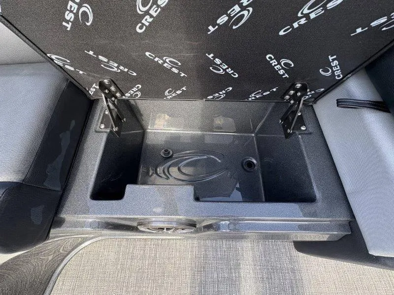 Slide: The Image of 2023 Crest Caribbean RS 230 SLC storage compartment with branded interior design. - 34