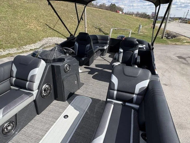 Slide: The Image of 2023 Crest Caribbean RS 230 SLC pontoon boat interior with modern seating and helm. - 37