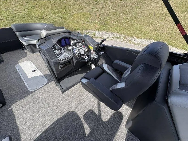 Slide: The Image of 2023 Crest Caribbean RS 230 SLC boat interior with modern helm and seating. - 44