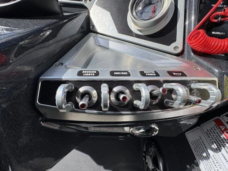 Slide: The Image of Control panel of 2023 Crest Caribbean RS 230 SLC boat with switches and labels. - 47