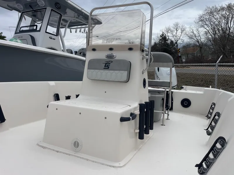 Slide: The Image of 2025 Carolina Skiff EV218 Sea Skiff boat interior with console and seating. - 10