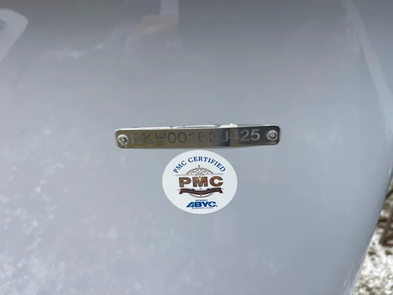 Slide: The Image of PMC certified Carolina Skiff EV218 Sea Skiff 2025 with identification plate. - 17
