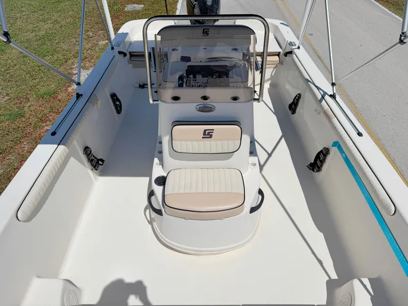Slide: The Image of 2020 Carolina Skiff 19 LS boat interior with seating and console, viewed from above. - 11