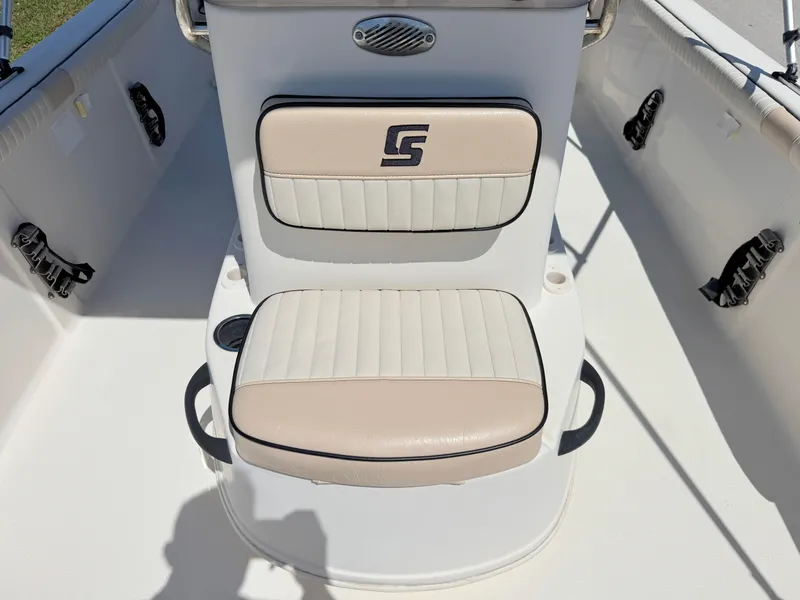 Slide: The Image of 2020 Carolina Skiff 19 LS boat seat with beige and white cushions. - 12