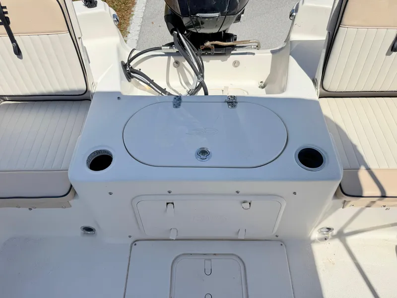 Slide: The Image of 2020 Carolina Skiff 19 LS boat interior with seating and storage compartments. - 20