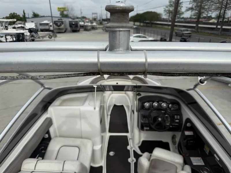 Slide: The Image of 2007 Yamaha Boats AR 230 interior view with steering console and seating. - 10