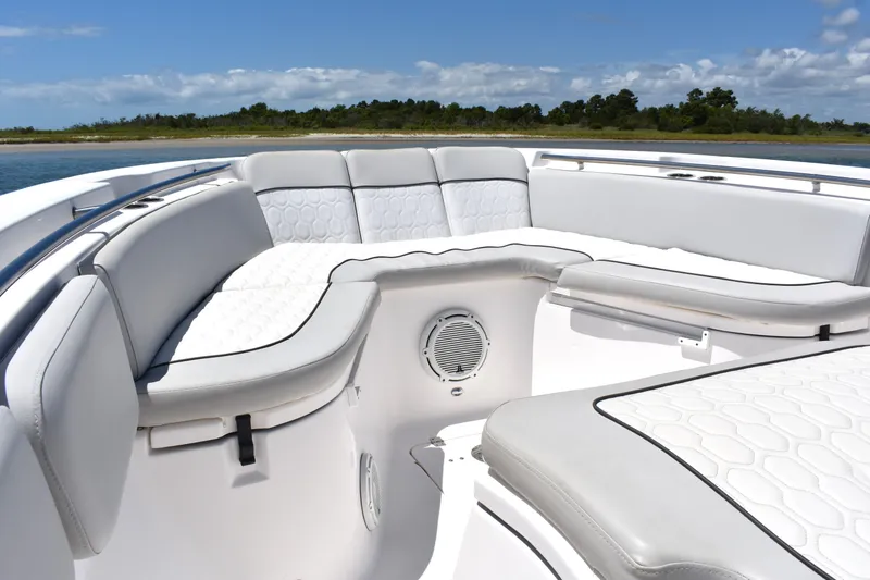 Slide: The Image of 2020 Sea Fox 288 Commander boat interior with white cushioned seating. - 13