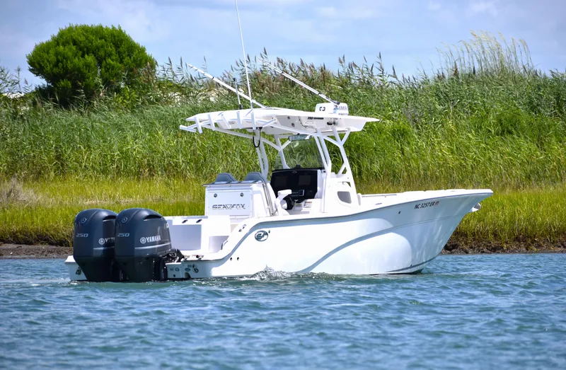Slide: The Image of 2020 Sea Fox 288 Commander boat on water, featuring dual Yamaha engines. - 5