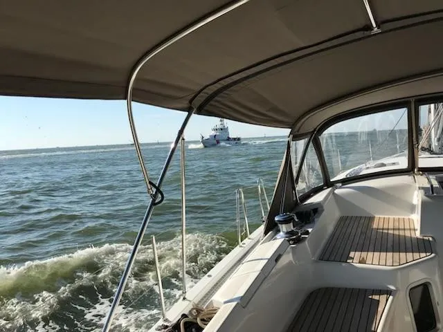 Slide: The Image of Jeanneau Sun Odyssey 51 sailing on open water, view from cockpit, 2017 model. - 33