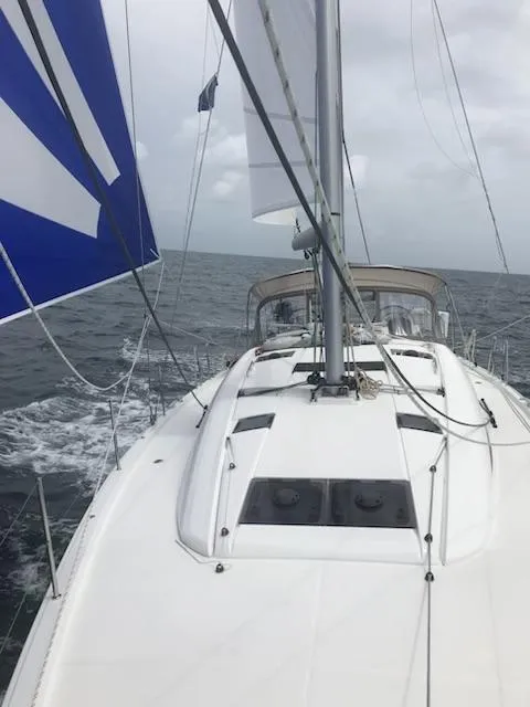 Slide: The Image of Jeanneau Sun Odyssey 51 sailing on open sea, 2017 model, with sails unfurled. - 37