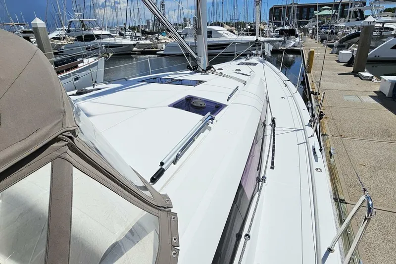 Slide: The Image of Jeanneau Sun Odyssey 51 sailboat docked at marina, 2017 model, sunny day. - 51