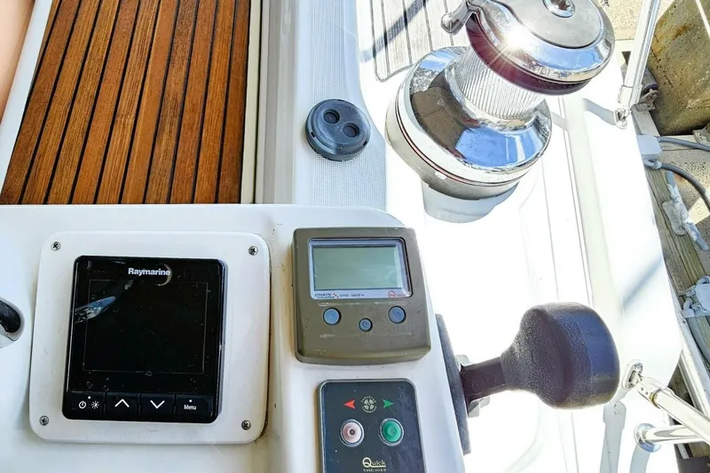 Slide: The Image of Control panel of 2017 Jeanneau Sun Odyssey 51 sailboat with Raymarine display and winch. - 47