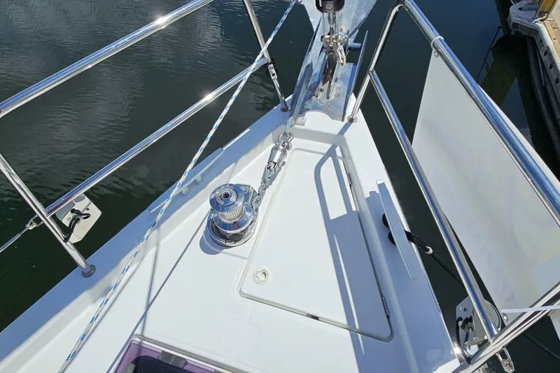 Slide: The Image of Bow of 2017 Jeanneau Sun Odyssey 51 sailboat with winch and railing. - 50