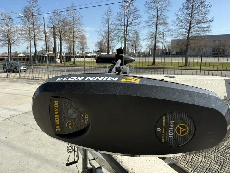 Slide: The Image of Minn Kota PowerDrive motor on 2009 Xpress H20 BAY boat, outdoor setting. - 11