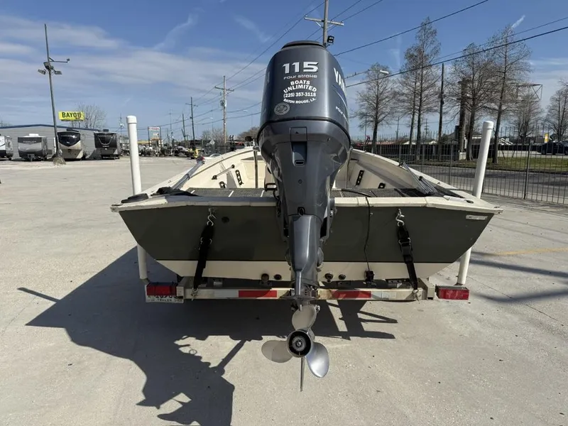 Slide: The Image of 2009 Xpress H20 BAY boat with Yamaha 115 outboard motor on trailer. - 3