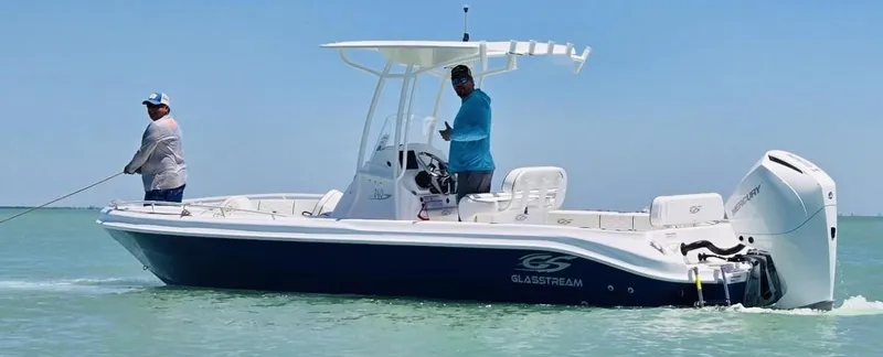 Slide: The Image of 2025 Glasstream 240 CCX boat on water with two people fishing. - 8