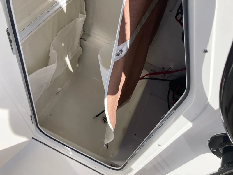 Slide: The Image of Storage compartment of 2025 Key West 219fs boat, featuring interior details and materials. - 16