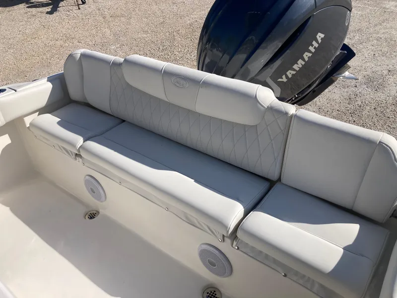 Slide: The Image of 2025 Key West 219fs boat with Yamaha engine, featuring comfortable seating and modern design. - 19